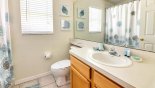 Family bathroom #2 with bath & shower over, single vanity & WC from Madison 3 Villa for rent in Orlando
