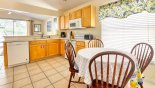 Villa rentals near Disney direct with owner, check out the Breakfast nook in kitchen with round table and 4 chairs