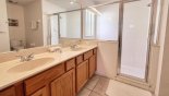 Master ensuite bathroom with large walk-in shower, his & hers sinks and WC from Highlands Reserve rental Villa direct from owner