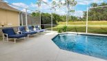 Pool deck with 4 sun loungers from Sandlewood 2 Villa for rent in Orlando