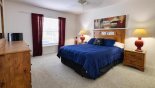 Villa rentals near Disney direct with owner, check out the Master bedroom with king sized bed and views onto the pool deck