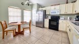 Spacious rental Highlands Reserve Villa in Orlando complete with stunning Kitchen with breakfast nook seating 2