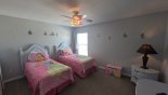 Bedroom #3 with twin beds and Disney Princess theming from Canterbury 5 Villa for rent in Orlando