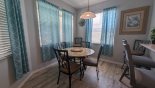 Villa rentals in Orlando, check out the Breakfast nook adjacent to kitchen with seating for 4/6 and views onto pool deck