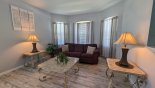 Spacious rental Highlands Reserve Villa in Orlando complete with stunning Front living room with views over front gardens