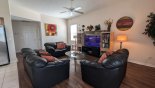 Villa rentals in Orlando, check out the Family room with ample seating to watch a movie on the large LCD cable TV with DVD player