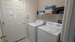 Villa rentals near Disney direct with owner, check out the Laundry room with washer, dryer, iron & ironing board